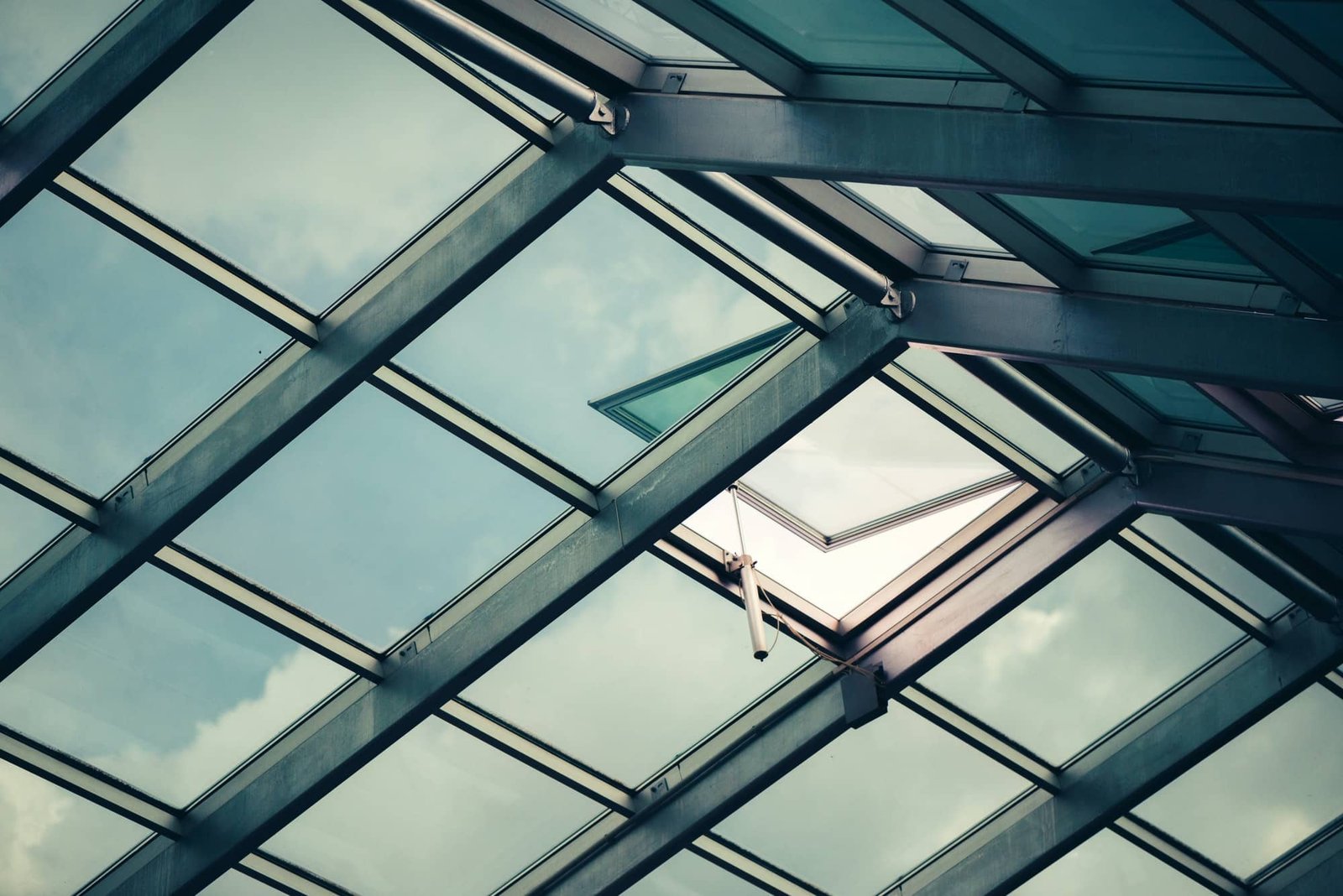 glass-skylight-roof-with-open-window